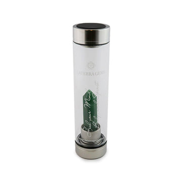 Taurus Laterra Gemstone Water Bottle with green quartz crystal attachment inside clear glass bottle on white background.